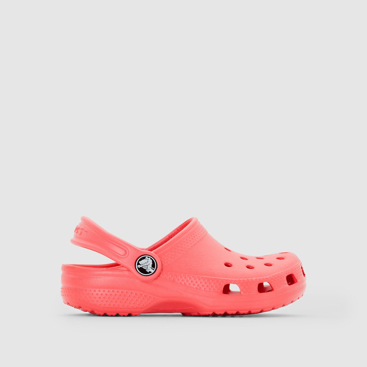Сабо CROCS Classic Kids Сабо CROCS Classic KidsСабо с задним ремешком на щиколотке, Classic Kids от CROCS .Верх : термопластик Croslite ™Подкладка : без подкладкиСтелька : термопластик Croslite ™Подошва : термопластик Croslite ™Застежка : ремешок Эти знаменитые сабо Classic от Crocs прекрасно смотрятся в любом возрасте : сабо Classic Kids не оставят наших детей равнодушными ! Невероятно удобная литая форма стопы из материала Croslite ™ практичные вентиляционные отверстия Jibbitz™, они такие легкие с нескользящей подошвой, не оставляющей следов … Какое удовольствие надеть эти сабо CROCS на прогулку и ощутить непревзойденный комфорт этой обуви .<br><br>Цвет: бирюзовый,розовый,фиолетовый<br>Размер: 32/33.32/33.32/33.34/35