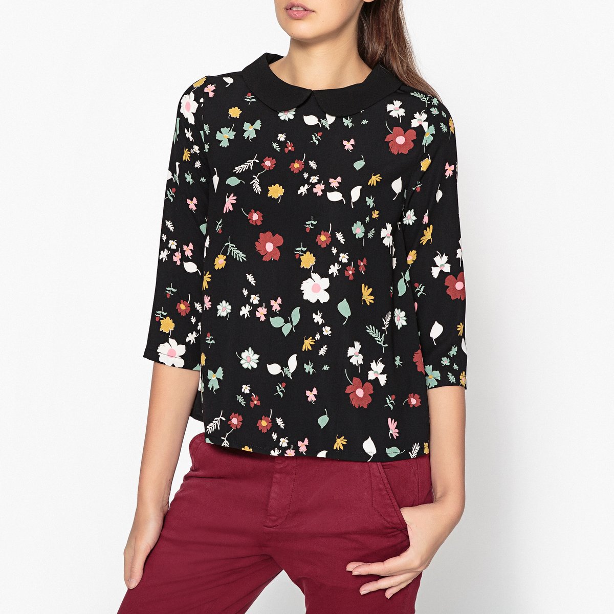 Блузка с рисунком DEAUVILLE Блузка с рисунком DEAUVILLEБлузка с рукавами 3/4 LA BRAND BOUTIQUE COLLECTION - модель DEAUVILLE из ткани с рисунком, отложным воротником и застежкой на пуговицы сзади.Детали • Рукава 3/4 • Покрой бойфренд, свободный • Отложной воротник • Цветочный рисунокСостав и уход • 100% полиэстер • Следуйте советам по уходу, указанным на этикетке<br><br>Цвет: рисунок черный