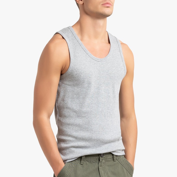 Man earing grey ribbed vest top 