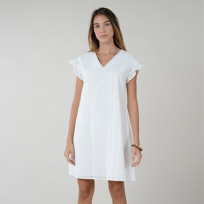 Woman wearing embroidered cotton smock dress.jpg