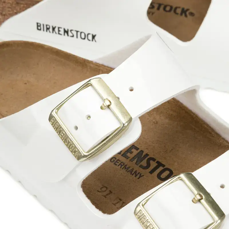 close-up-white-arizona-birkenstock-sandals.webp