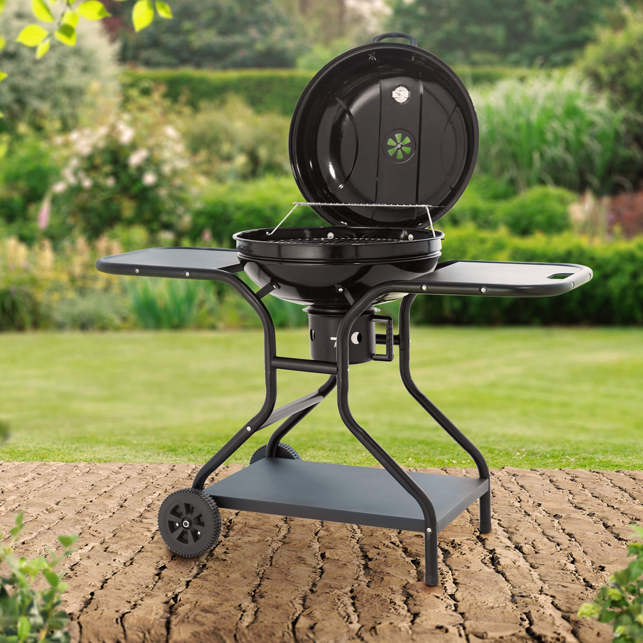 tower-bbq-grill-with-tables-in-garden.jpg