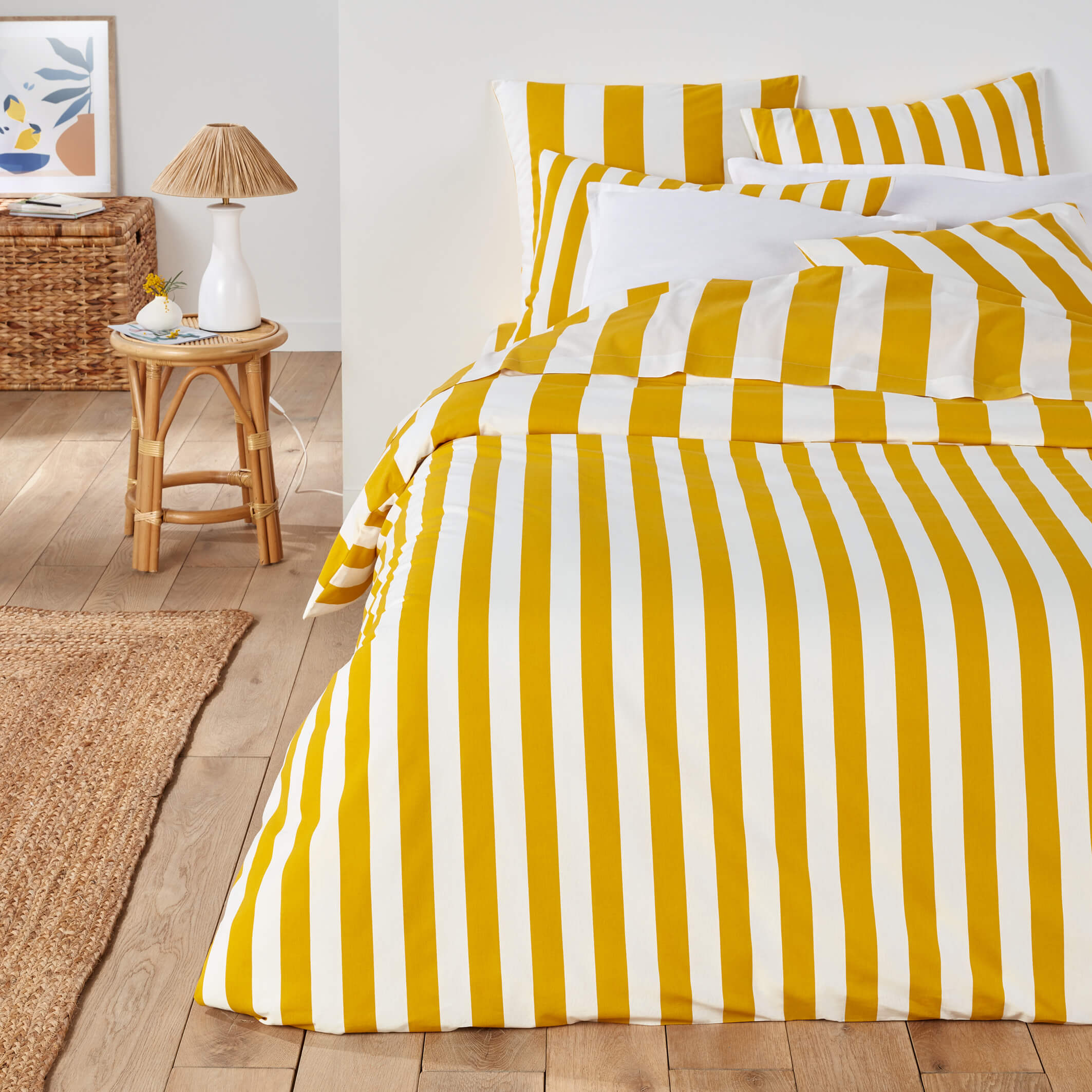 yellow-and-white-stripe-bedding-in-room.jpg