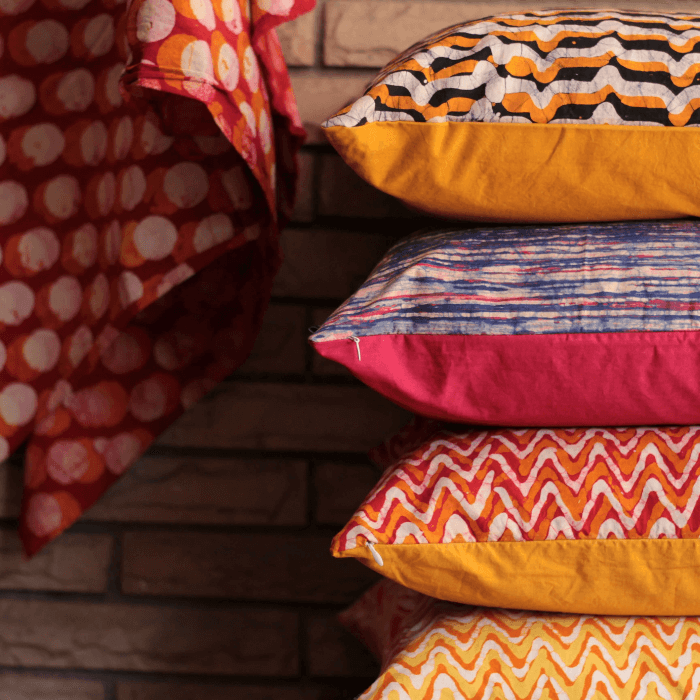 four-patterned-cushions-piled-up.png