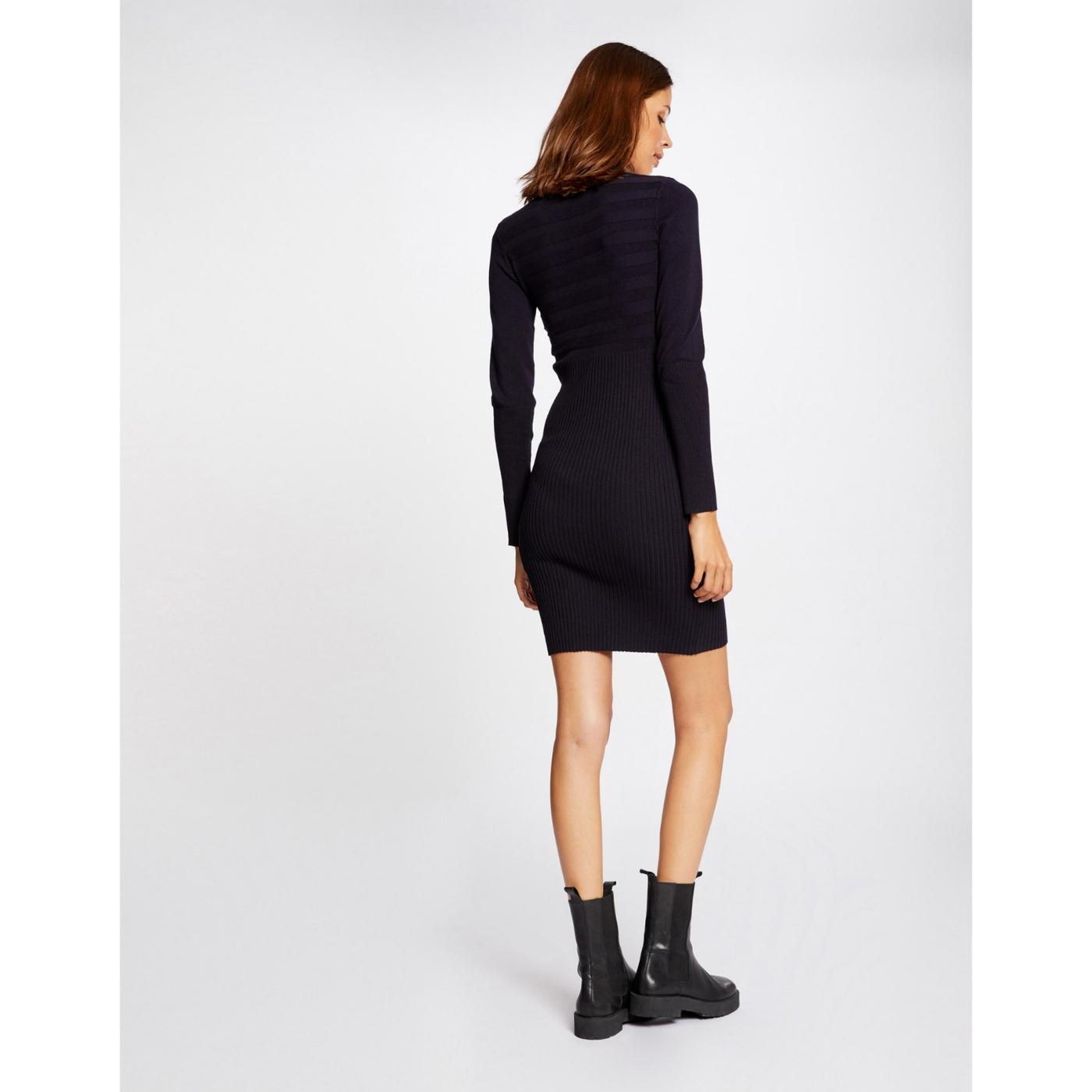 woman-wearing-navy-jumper-dress-with-chelsea-boots.jpg