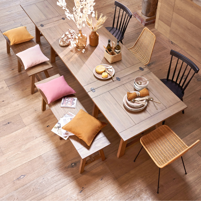 large-dining-table-bench-rattan-chairs.png