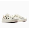 Black polka dot print/white background