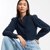 Chemise col volanté