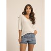 Pull blanc paillettes