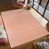 Tapis géométrique rose