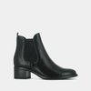 Black patent heeled boots
