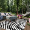 Tapis géométrique noir et blanc