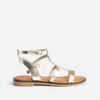 Sandales cloutées beige
