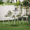 Table ronde blanche avec chaises