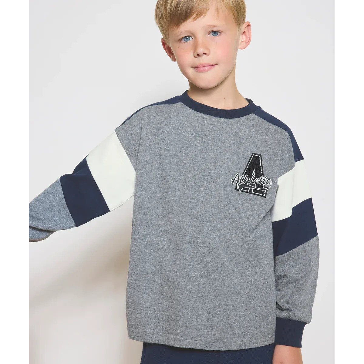 Click to view product details and reviews for Colour Block T Shirt With Long Sleeves.