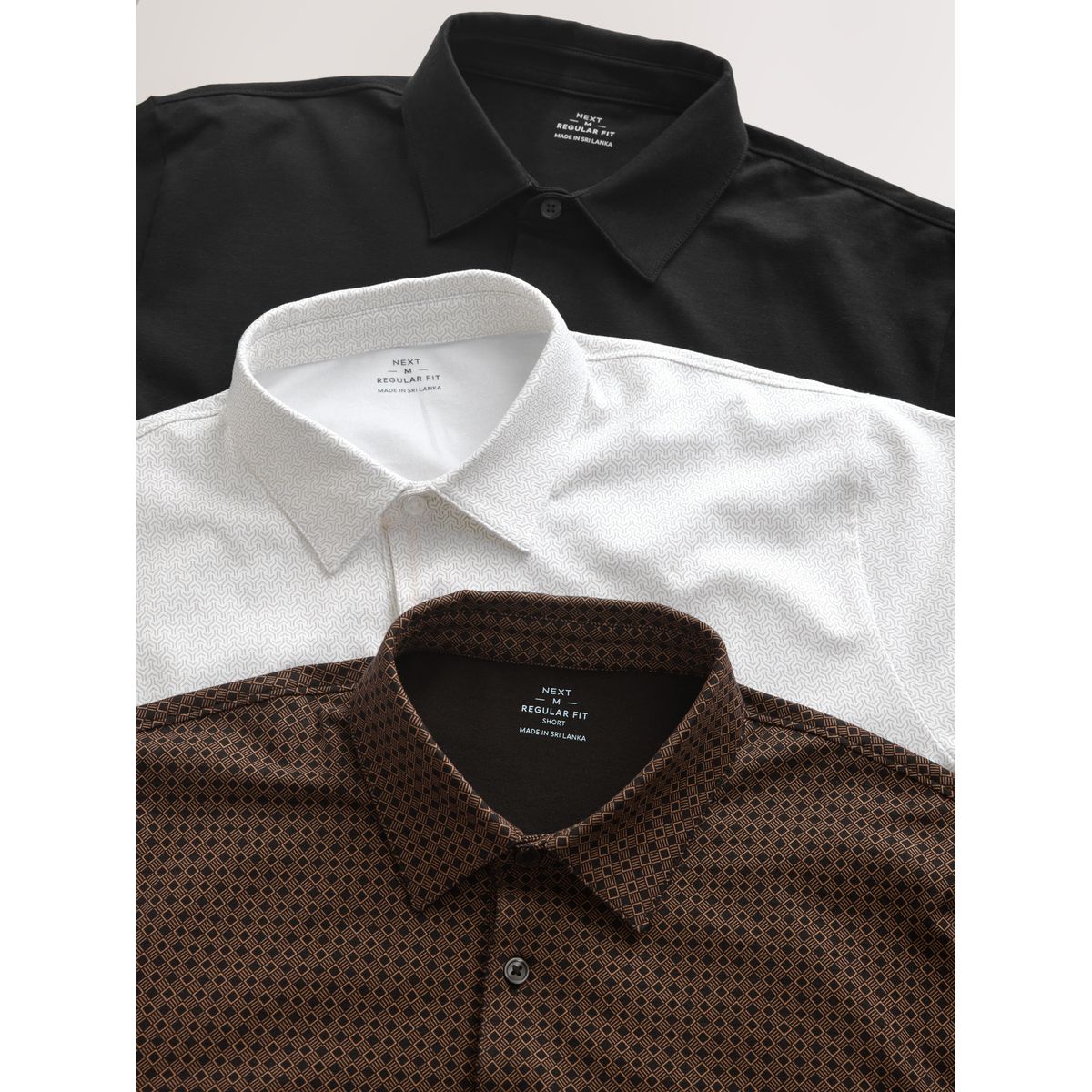Polo en jersey à manches courtes, lot de 3 géo en or noir, NEXT