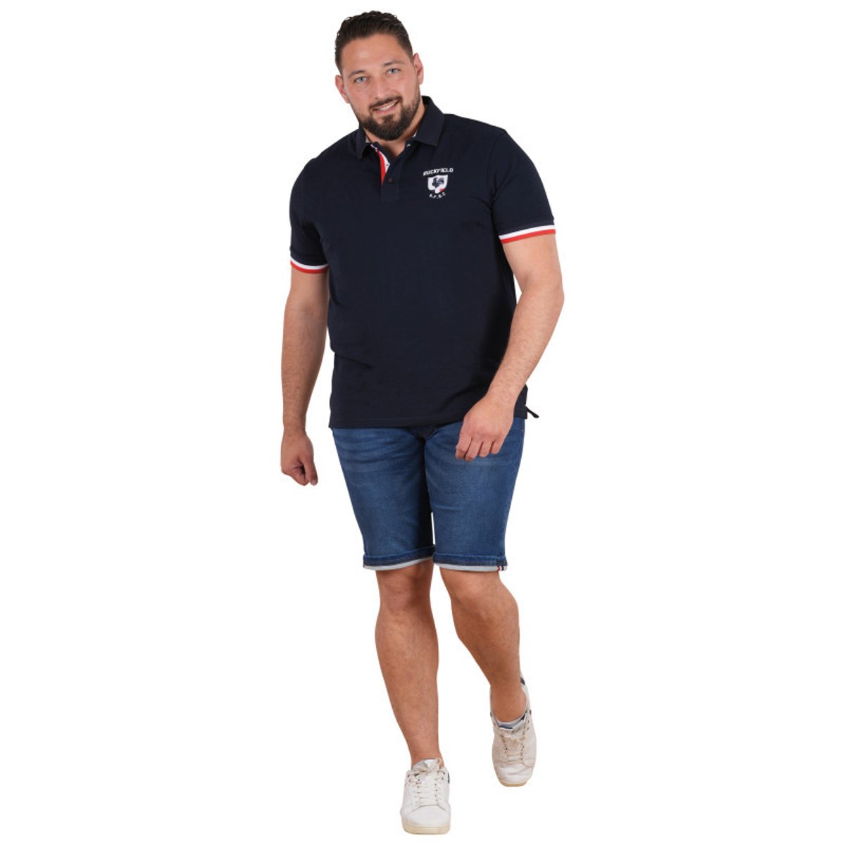 Polo en coton biologique marine uni pourvu de manches courtes bleu foncé, RUCKFIELD