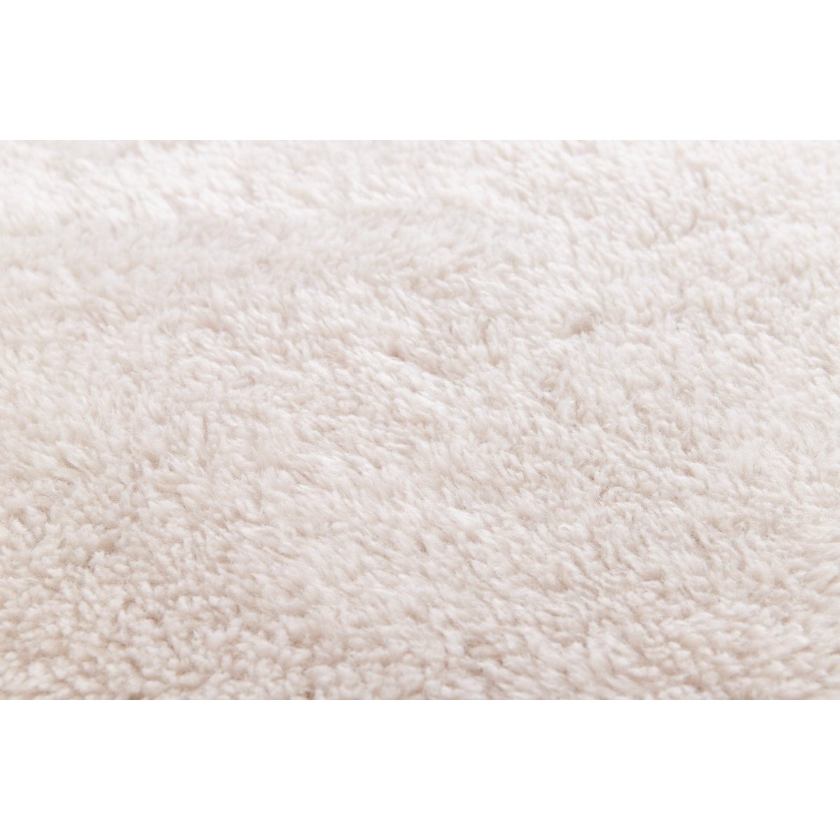 Tapis shaggy ultra-doux forme organique DUVKA beige sable, AFK LIVING