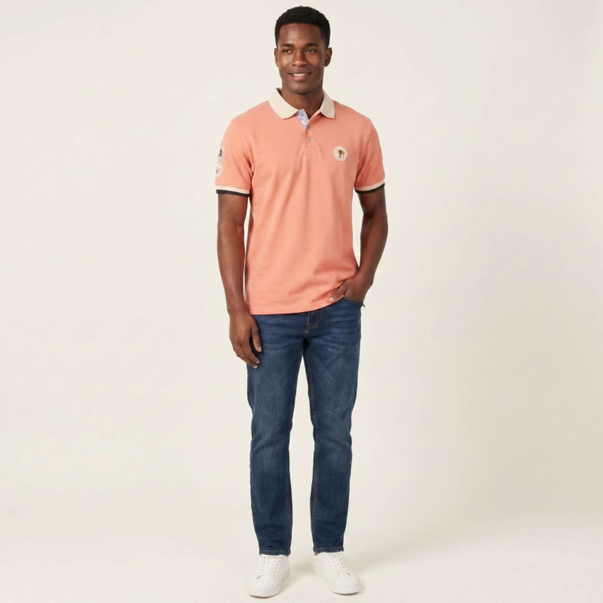 Polo en coton biologique corail uni pourvu d'un col boutonné rose, RUCKFIELD
