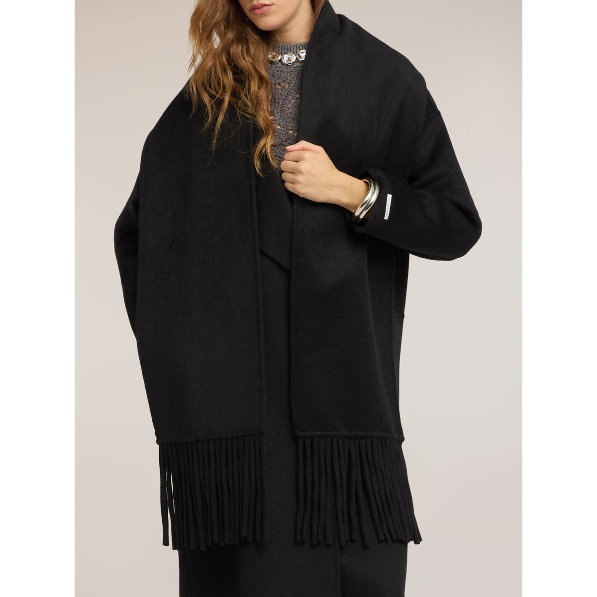 Manteau croisé noir, MOTIVI