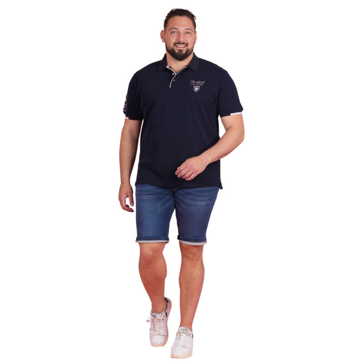 Polo en coton marine uni pourvu d'une coupe droite et d'un col boutonné bleu foncé, RUCKFIELD