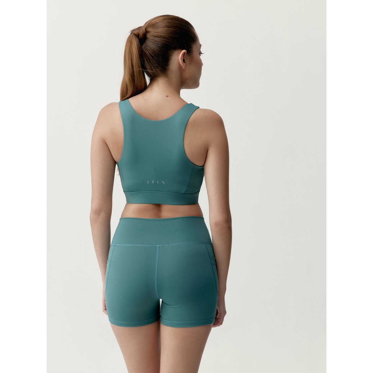 Brassière de sport femme Eider Maintien élevé fermeture éclair bleu sarcelle, BORN