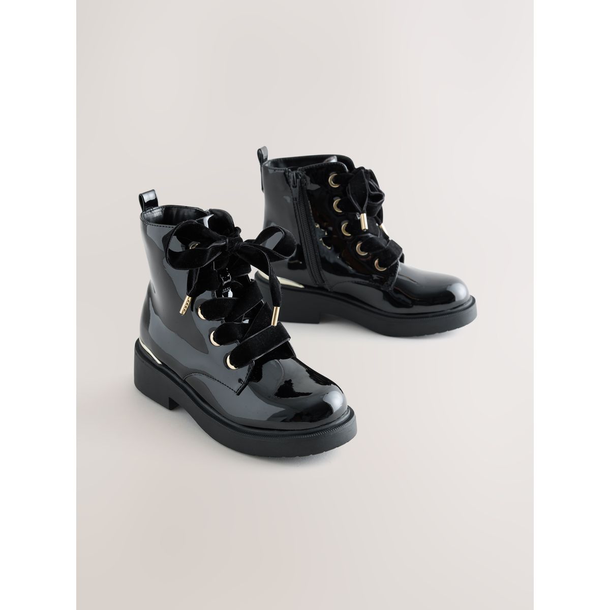 Bottines à nœud noir, NEXT