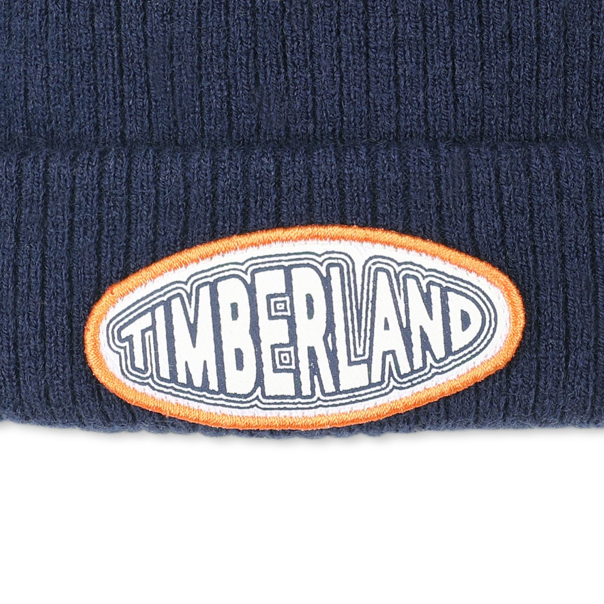 Bonnet tricoté avec des pompons en polaire indigo blue, TIMBERLAND