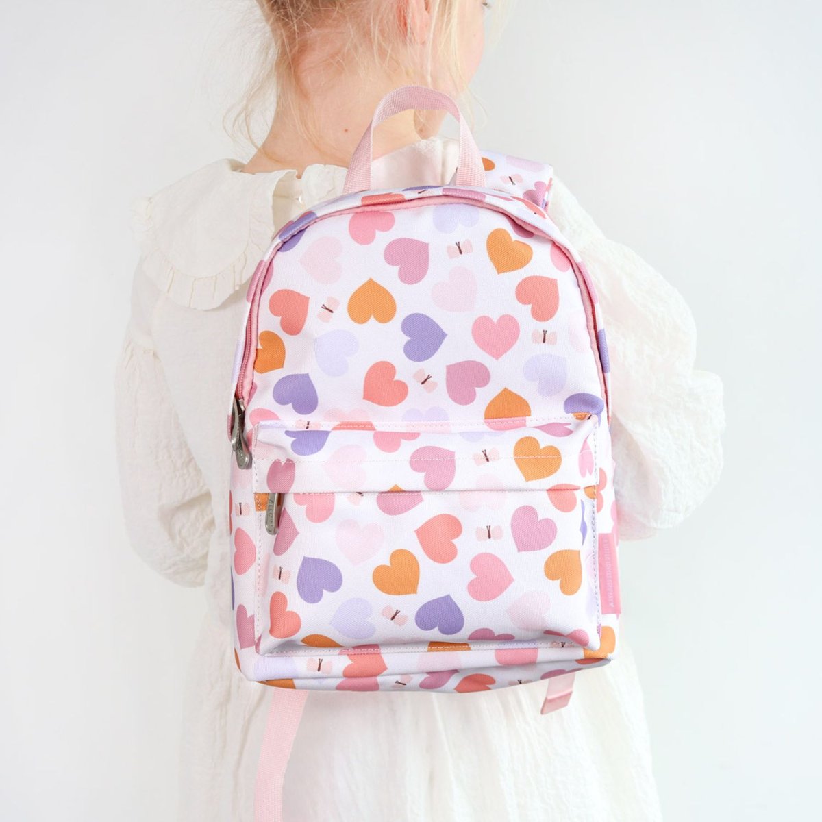 Sac à dos bébé rose, orange, violet, A LITTLE LOVELY COMPANY