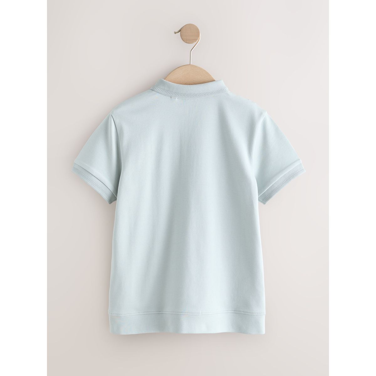 Polo texturé à col zippé et manches courtes bleu, NEXT