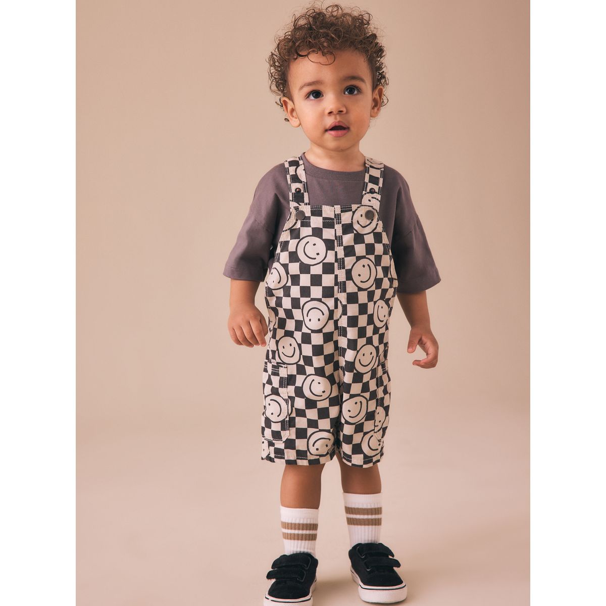 Salopette damier visage souriant noir/neutre, NEXT