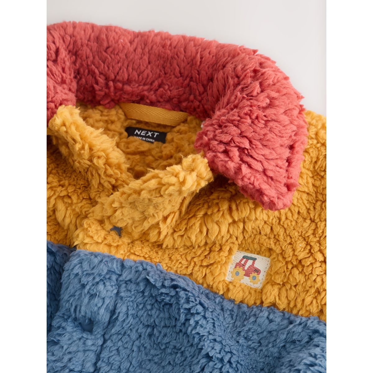 Veste-chemise en polaire aspect mouton bloc de couleurs bleu/jaune vif, NEXT