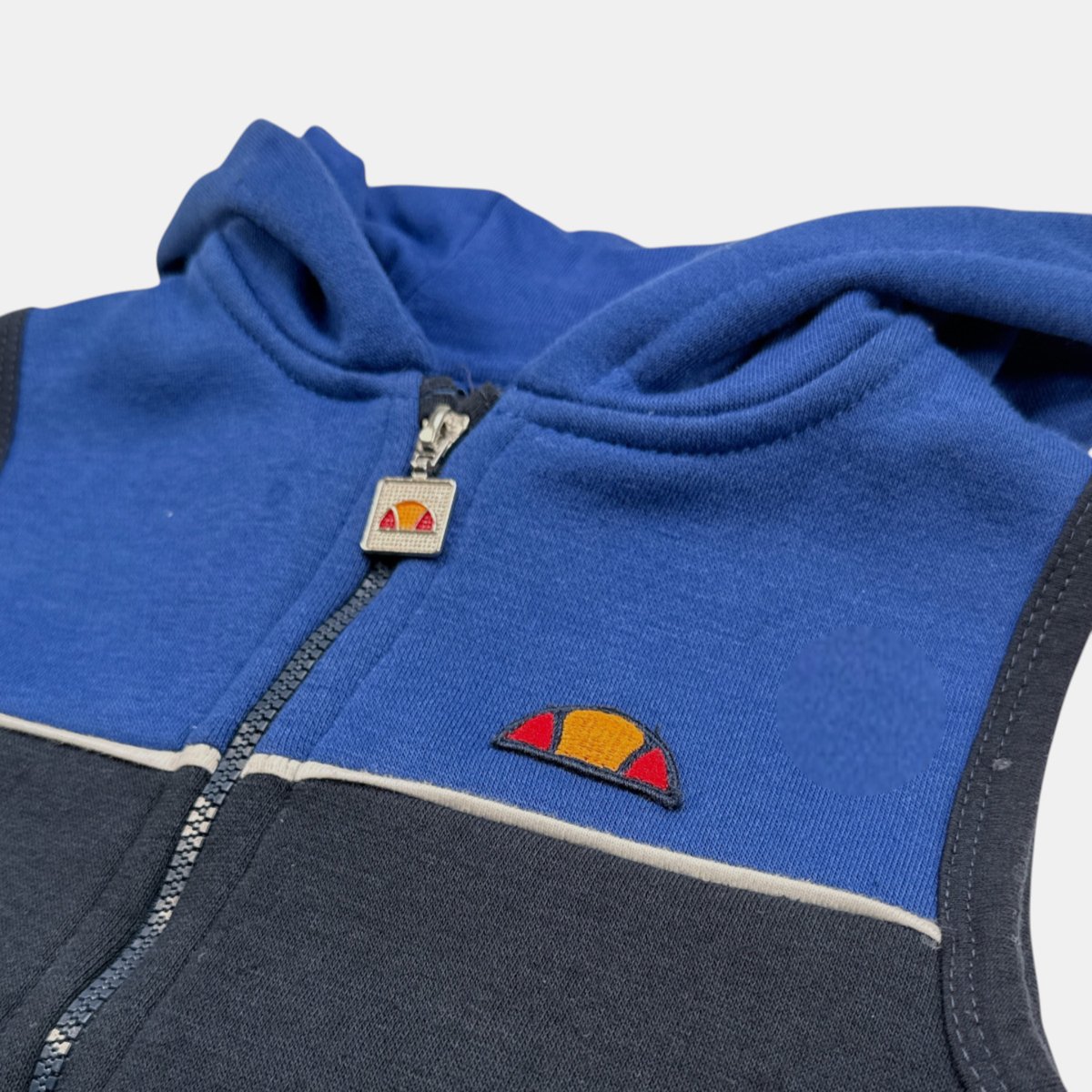 Ensemble 3 pièces doudoune sans manches, t-shirt et pantalon de jogging SQUAD bleu marine, ELLESSE