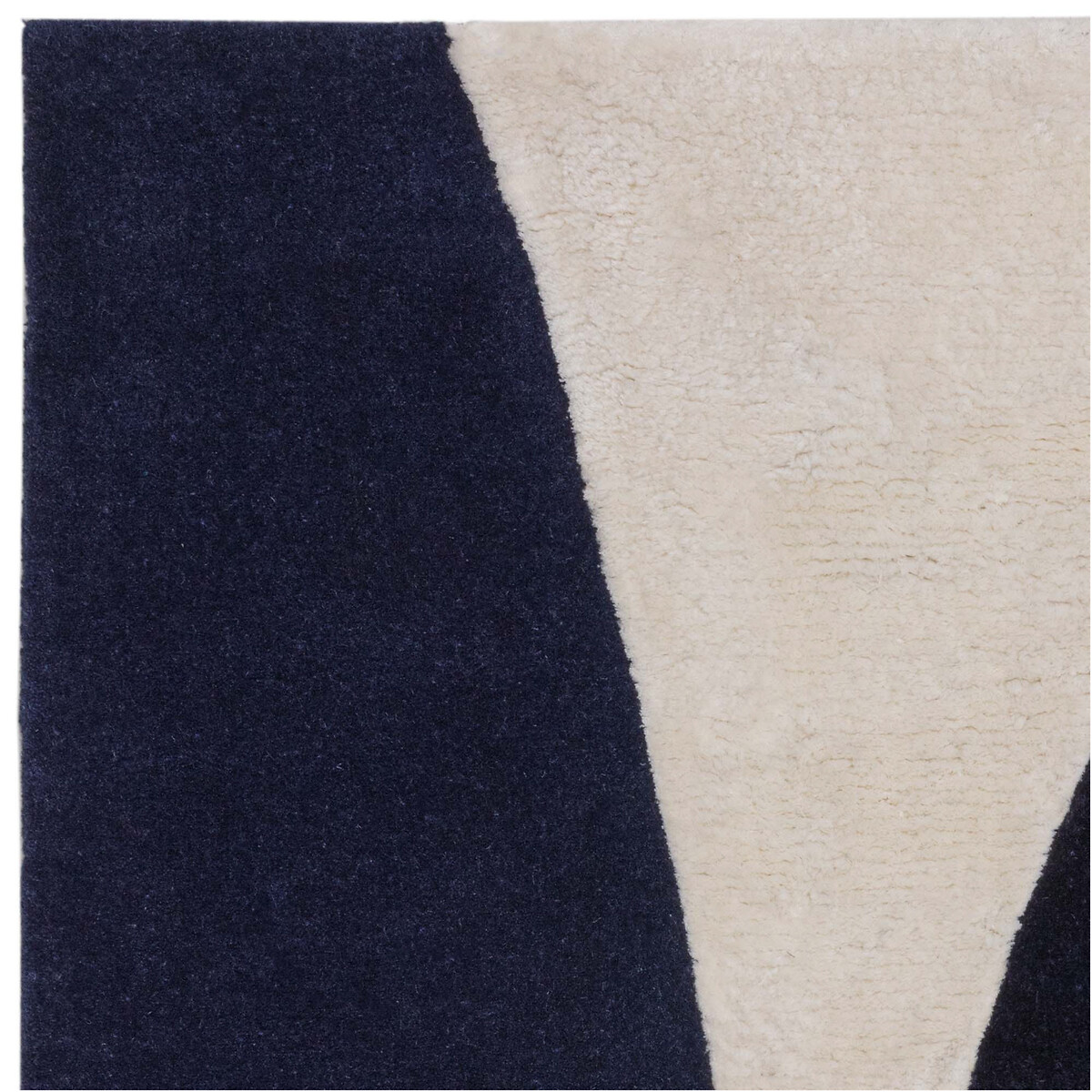 Abstract Irregular Carved Shape Rug in 100% Wool indigo, ÉDITÉ
