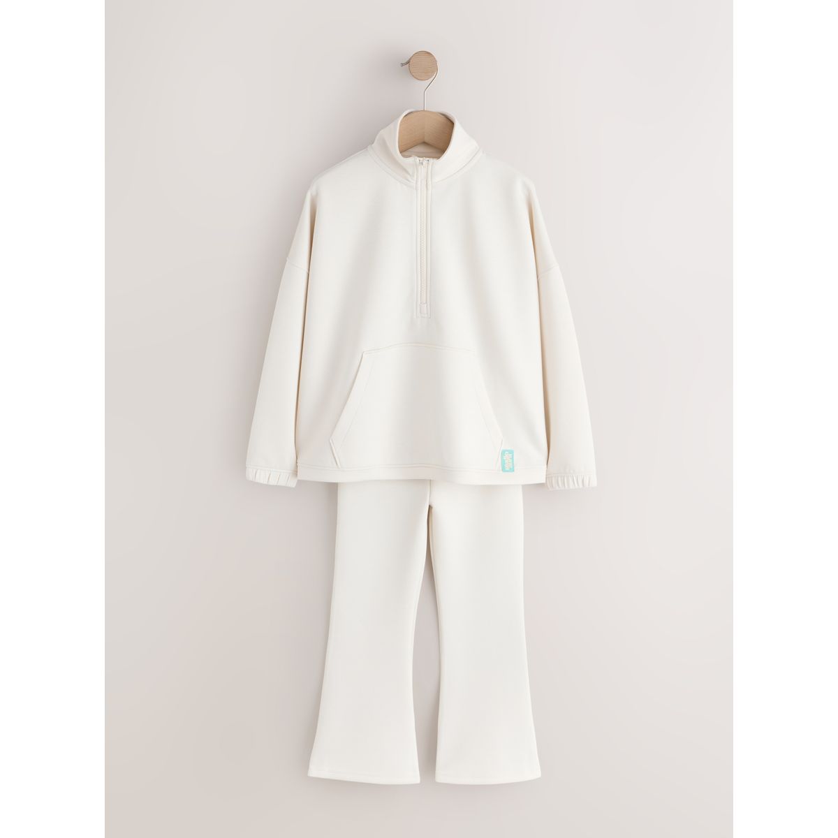 Ensemble haut à col zippé et pantalon évasé crème/naturel, NEXT