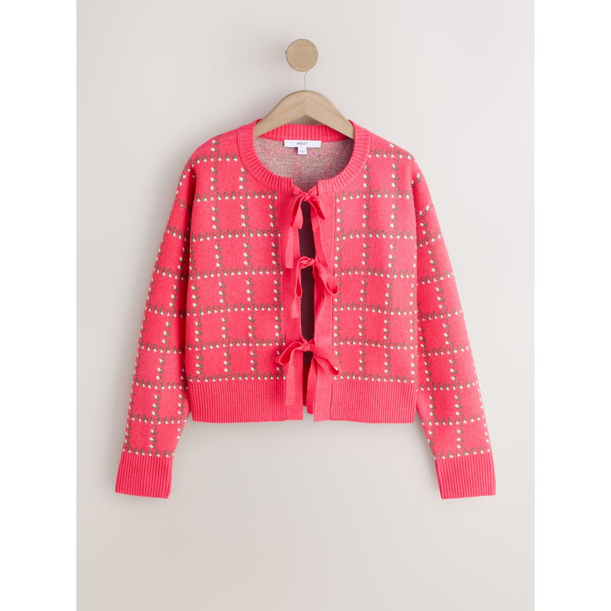 Cardigan en maille douce noué sur le devant motifs floraux roses, NEXT