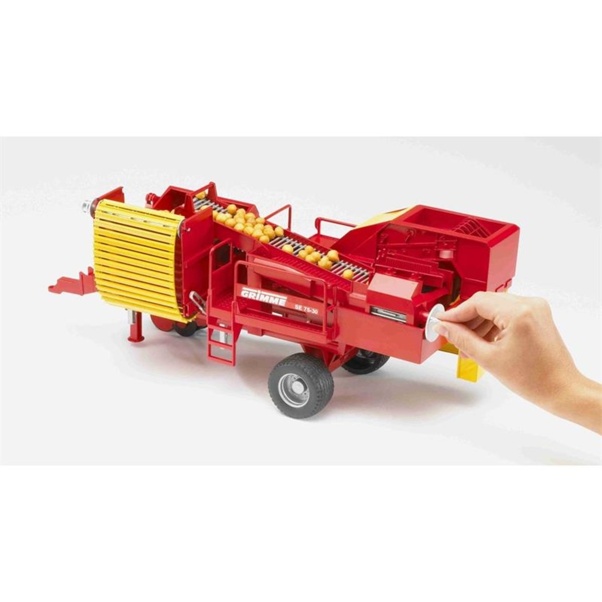 Arracheuse de pommes de terre Grimme SE 75-30 avec pommes de terre rouge et jaune, BRUDER