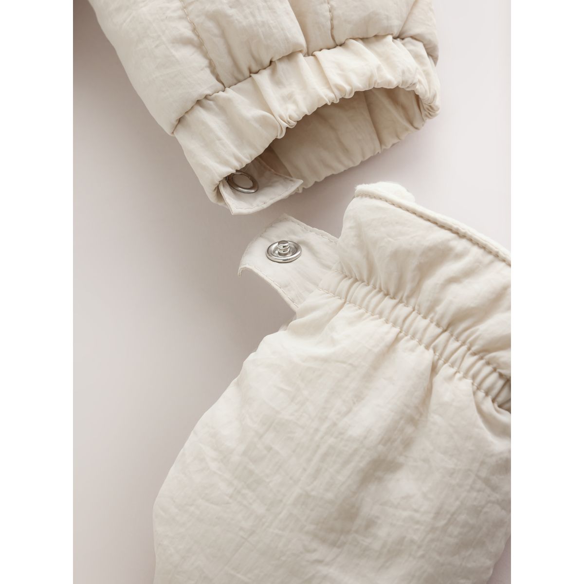 Combinaison bébé en nylon matelassé crème, NEXT