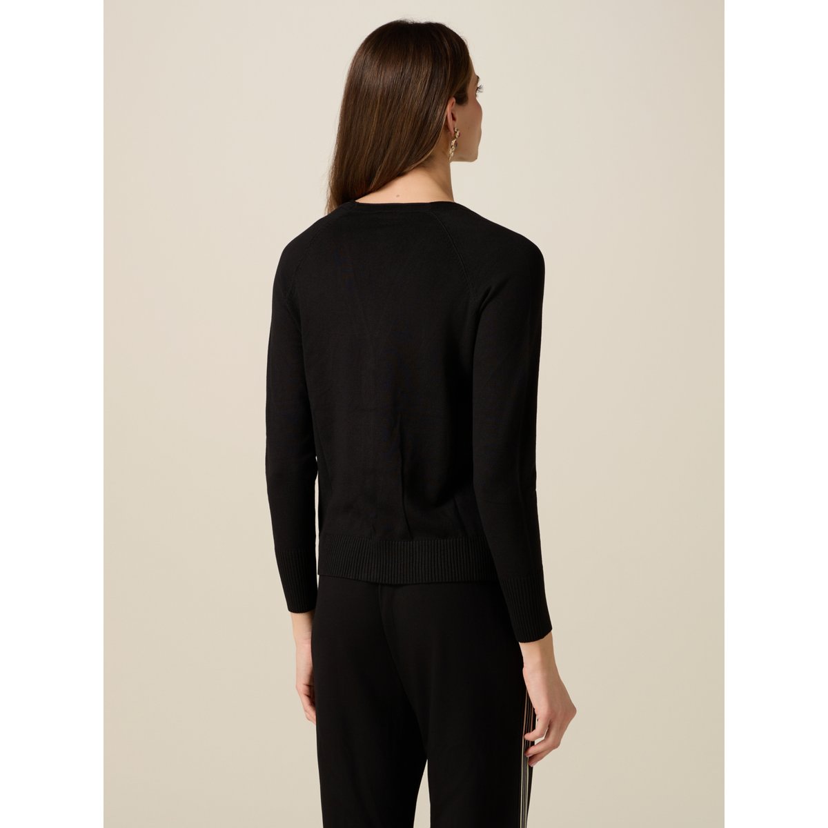 Cardigan noir, OLTRE