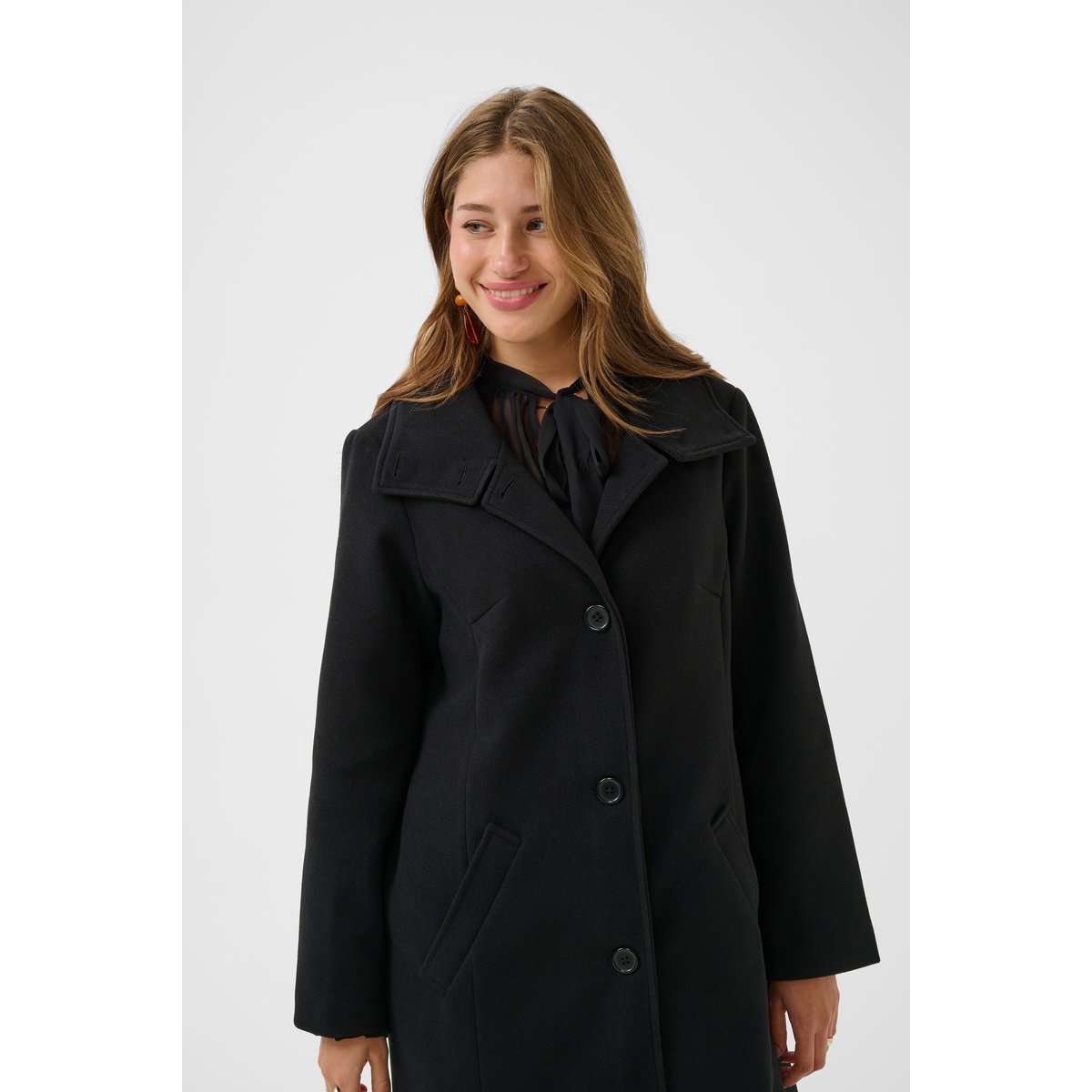 Manteau noir, CREAM