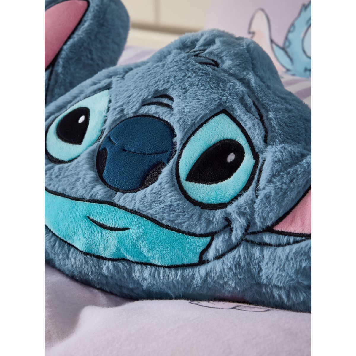 Coussin pelucheux point de couture, NEXT