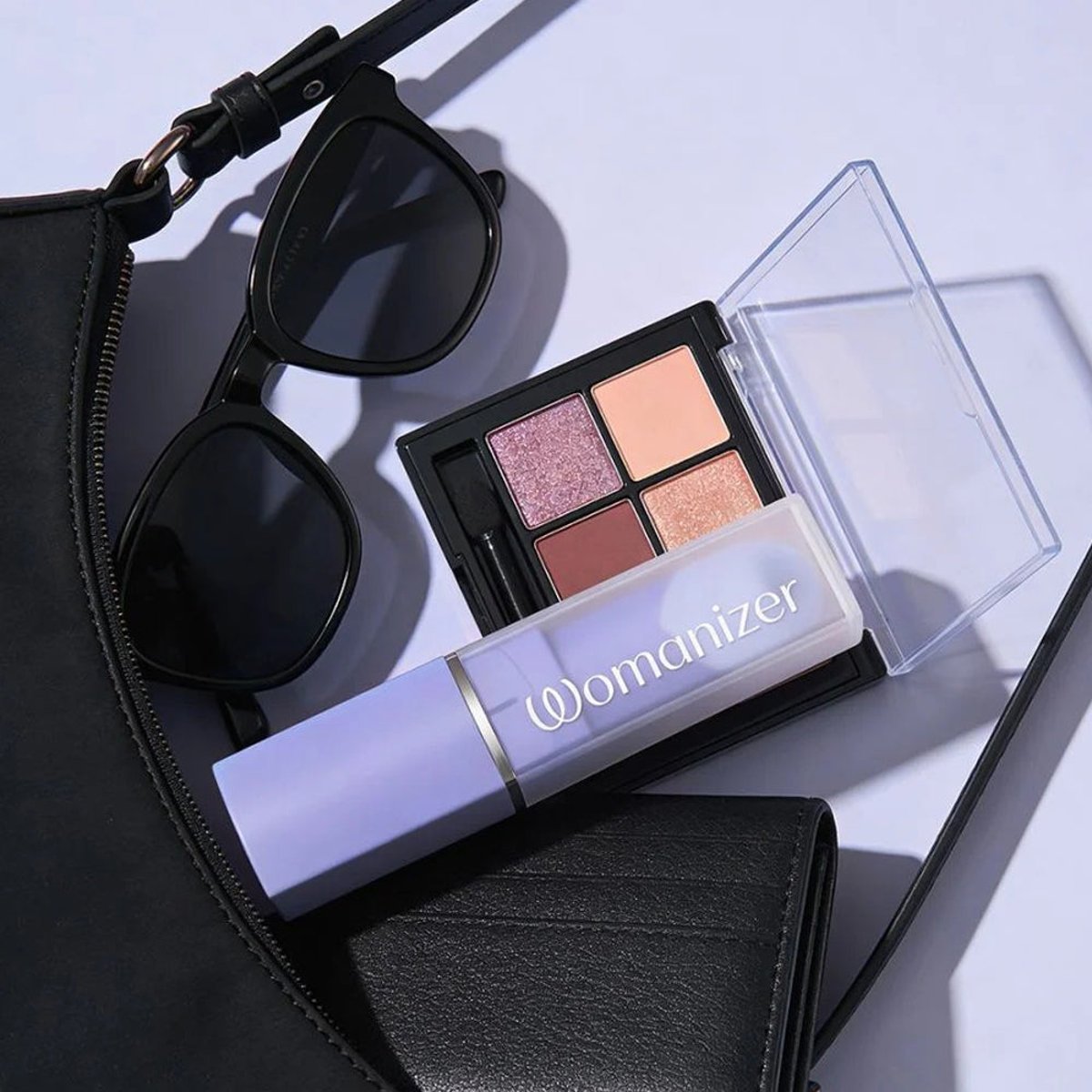 Stimulateur clitoridien Beauty violet, WOMANIZER
