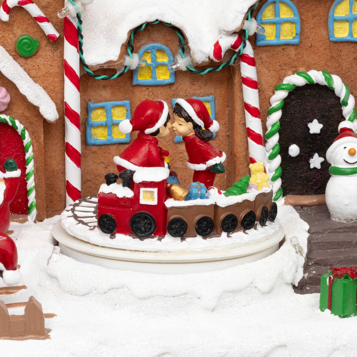 Village lumineux Père Noël bonhomme de neige train 11 LED musical et avec mouvement multicolore, ATMOSPHERA