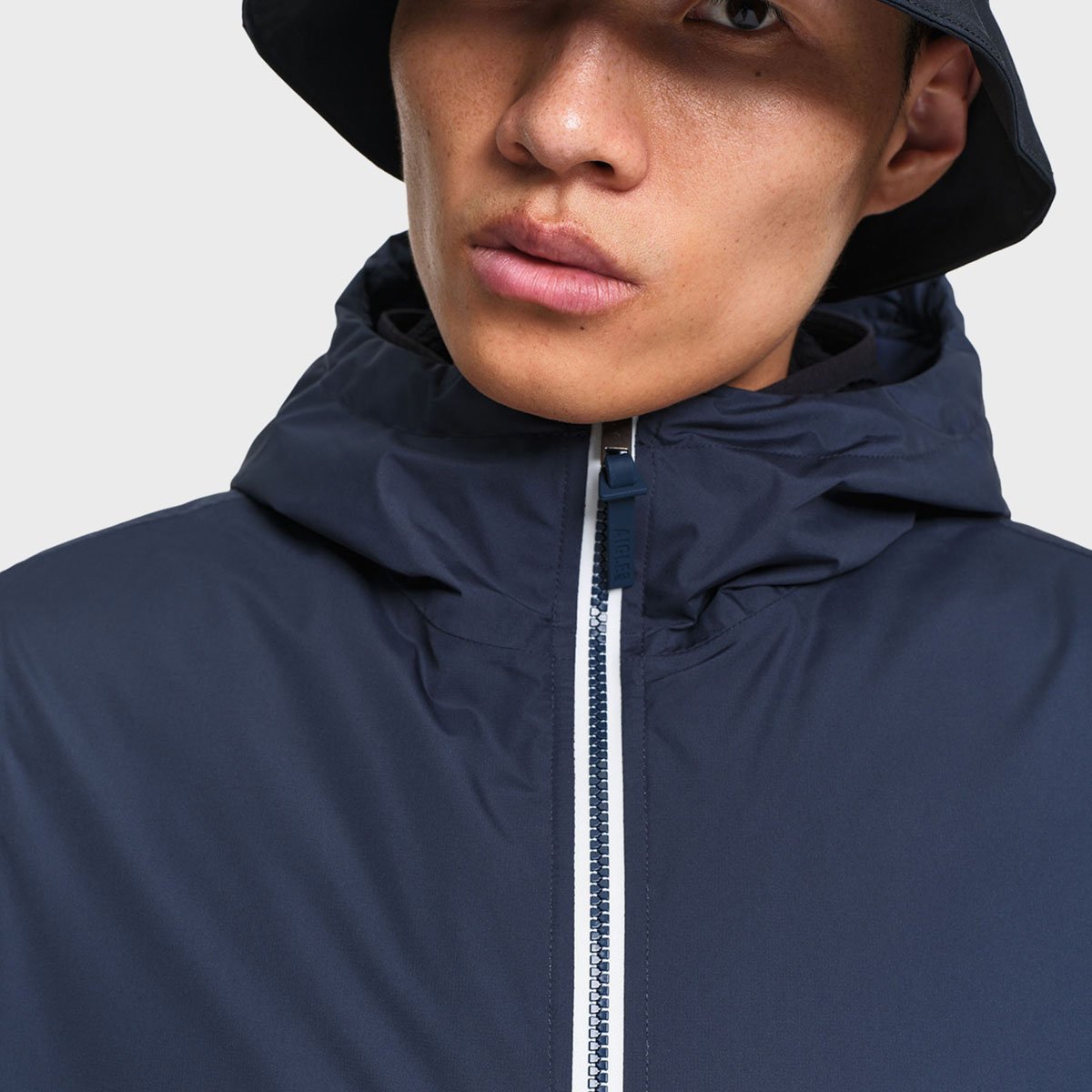 Veste imperméable matelassé capuche Rainpack Warm 70 bleu marine, AIGLE