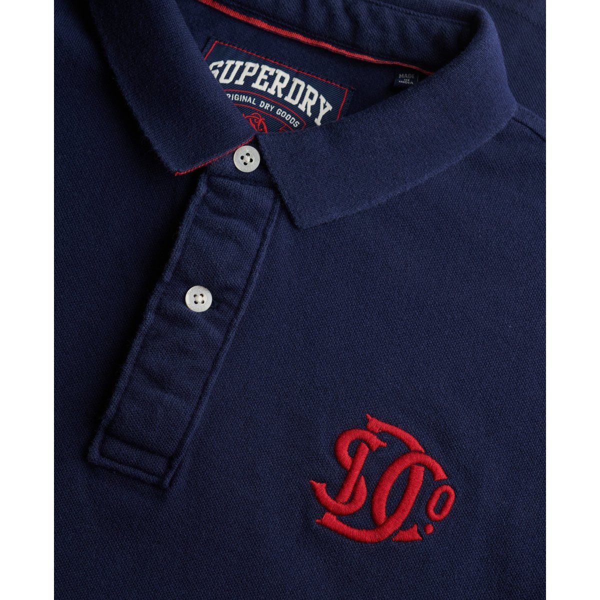 Polo Piqué Monogram bleu marine intense/rouge, SUPERDRY