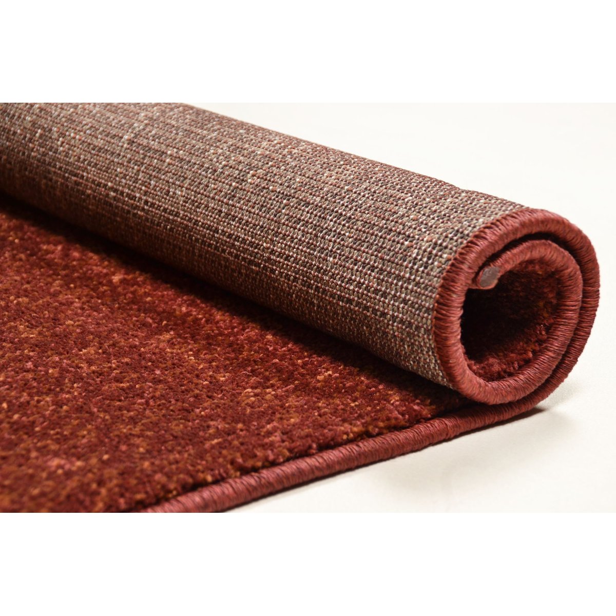 Tapis brillant RENZO - tissé à la machine - en 100% polypropylène terracotta, THEKO