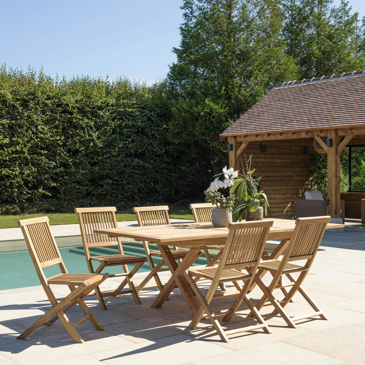 Salon de jardin teck brut table pieds en croix 180/240 + 6 chaises bord droit SUMMER bois naturel, PIER IMPORT