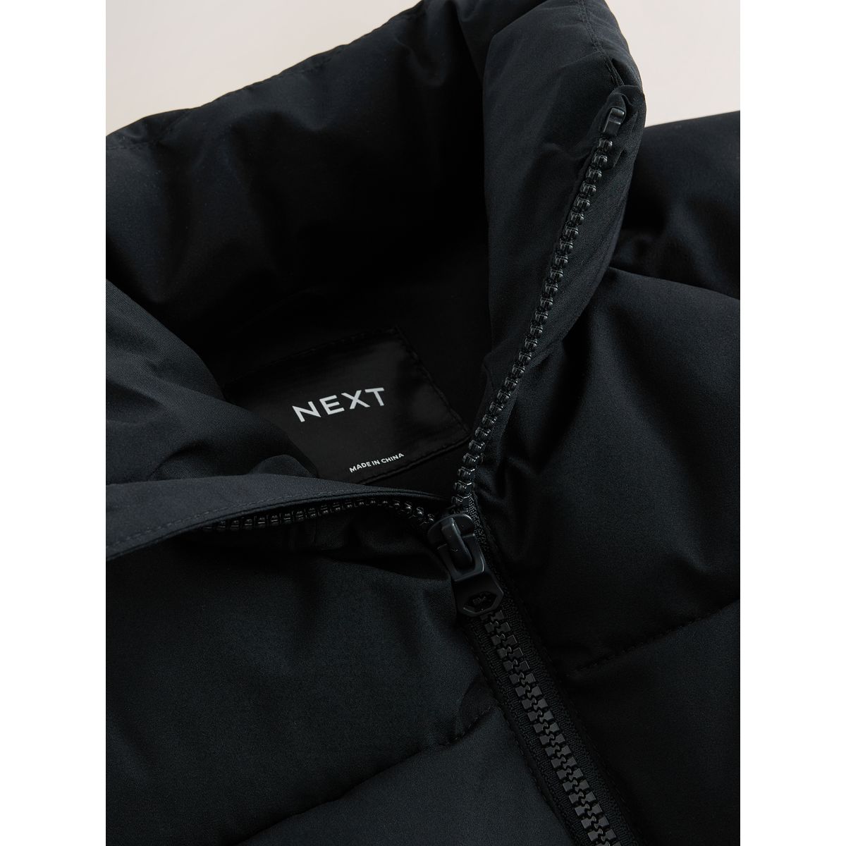 Manteau rembourré sans capuche à micropolaire noir, NEXT