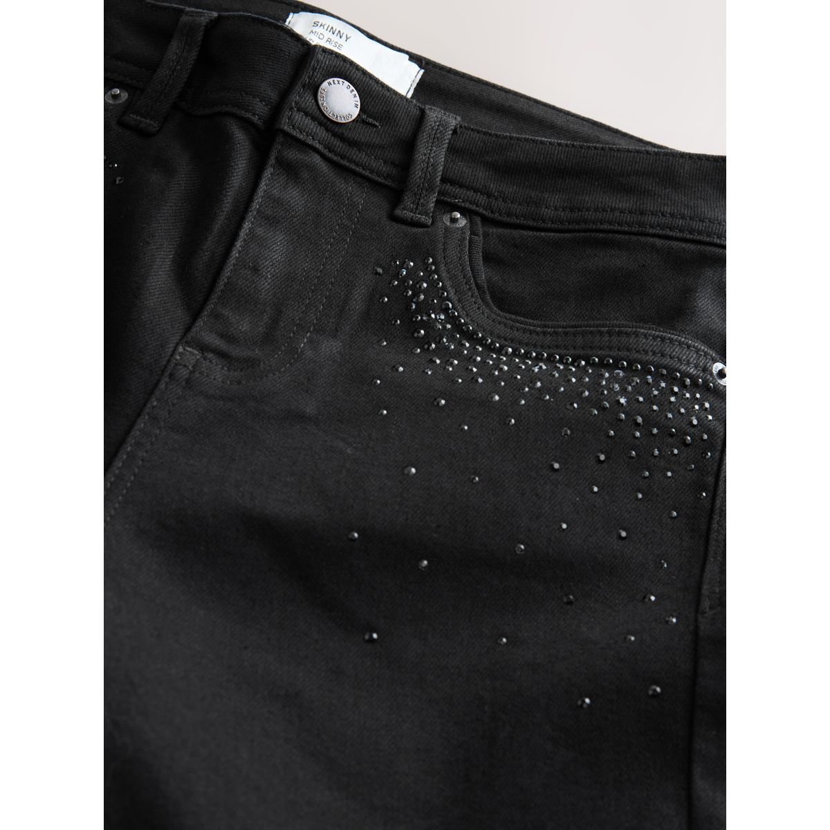 Jean skinny ultra-doux pochette noire ornée, NEXT