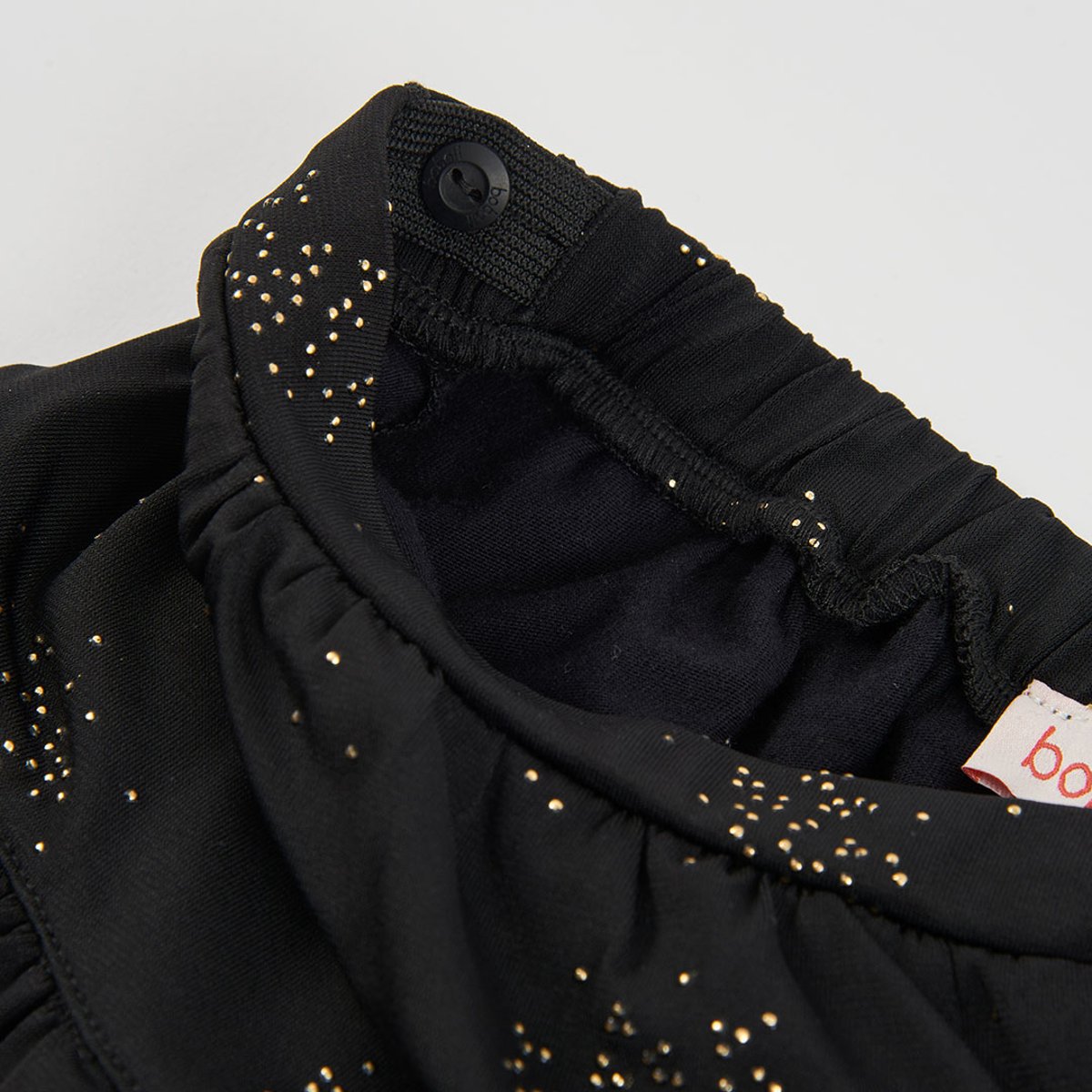 Jupe fille en maille imprimée avec étoiles et volants noir, BOBOLI